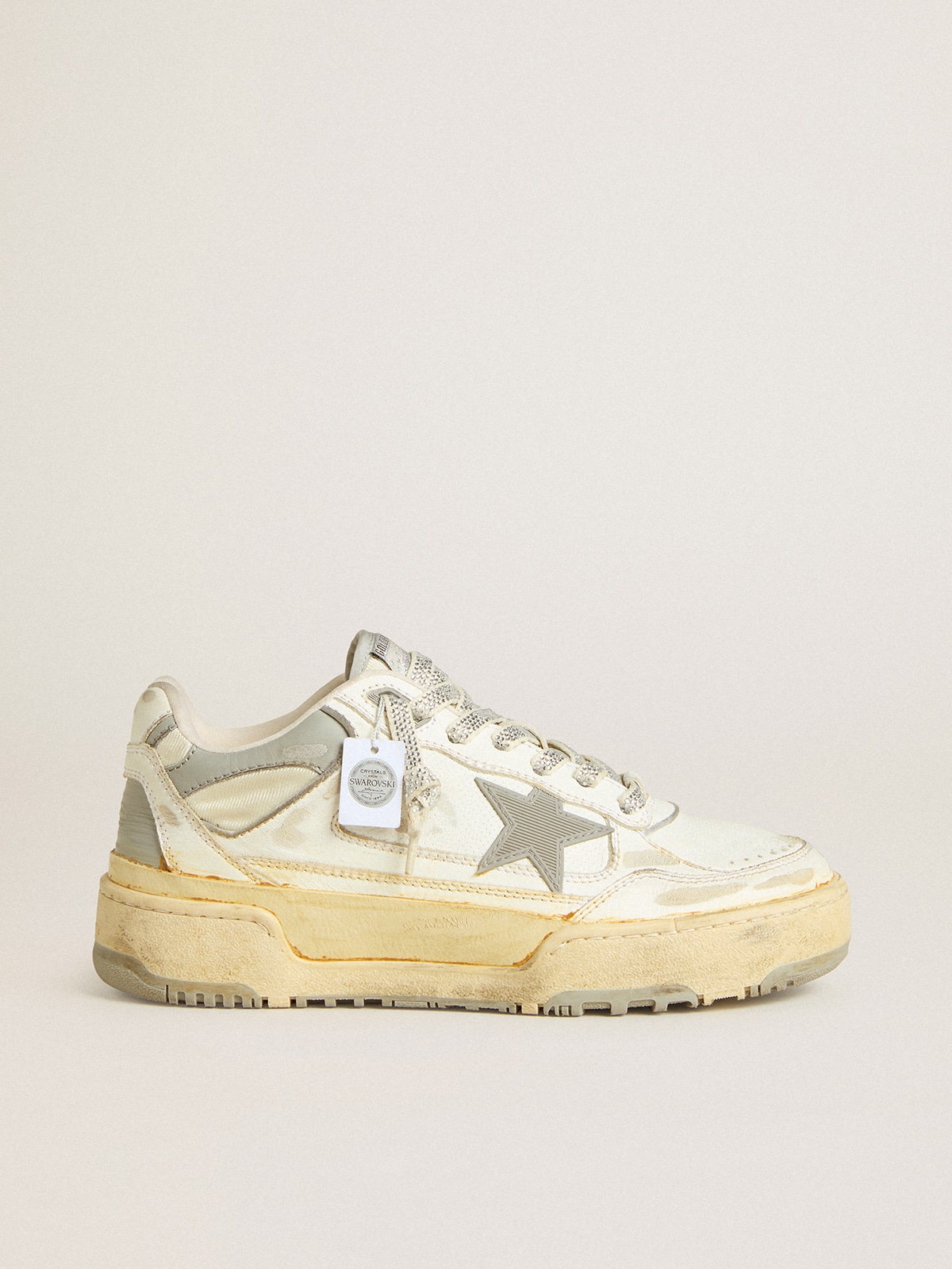 0041e20331f436de5b5732437a378fbac976b0e30f1061c856c9cae587678ac1 Women's Forty2 in white leather with laces with Swarovski crystals and gray TPU star - Image 1