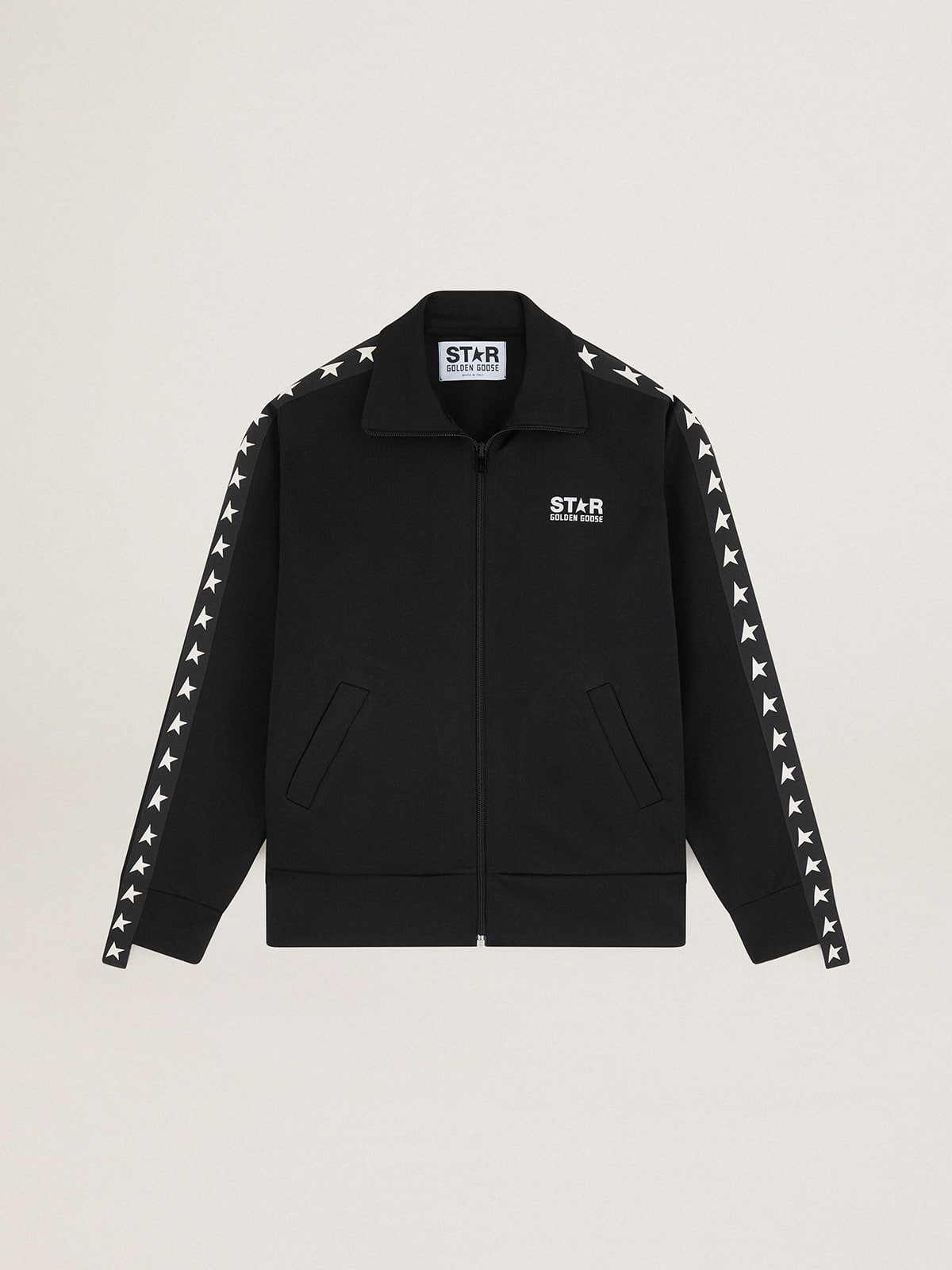 02e3326be9066f2ef73bac04ca87a14d6277aa48c0fc58871ed28e4792330891 Women's black zipped sweatshirt with white stars - Image 1