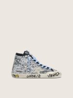 Young Francy in silver sequins with ice-gray suede star