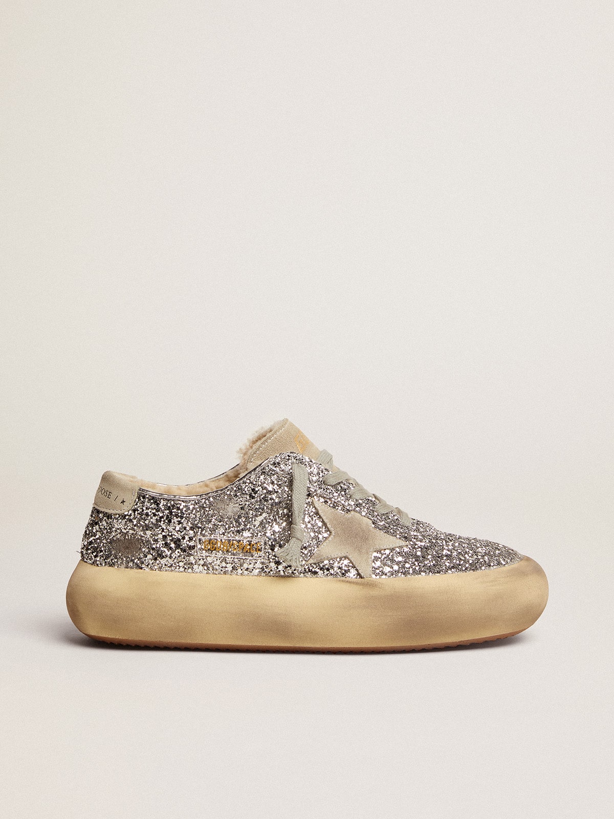 0cbca86b0fd9f75475c9aaedec360a3bc373c3be41abb1fff38ab54a3133bdc1 Women's Space-Star shoes in silver glitter with shearling lining - Image 1