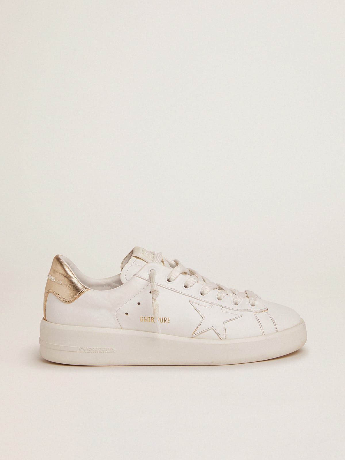 0d1586e14af1b5a7bec77a1bc192db2ad09948f7d4b8b0a53d96363bc227a805 Women's Purestar sneakers with gold-coloured heel tab - Image 1