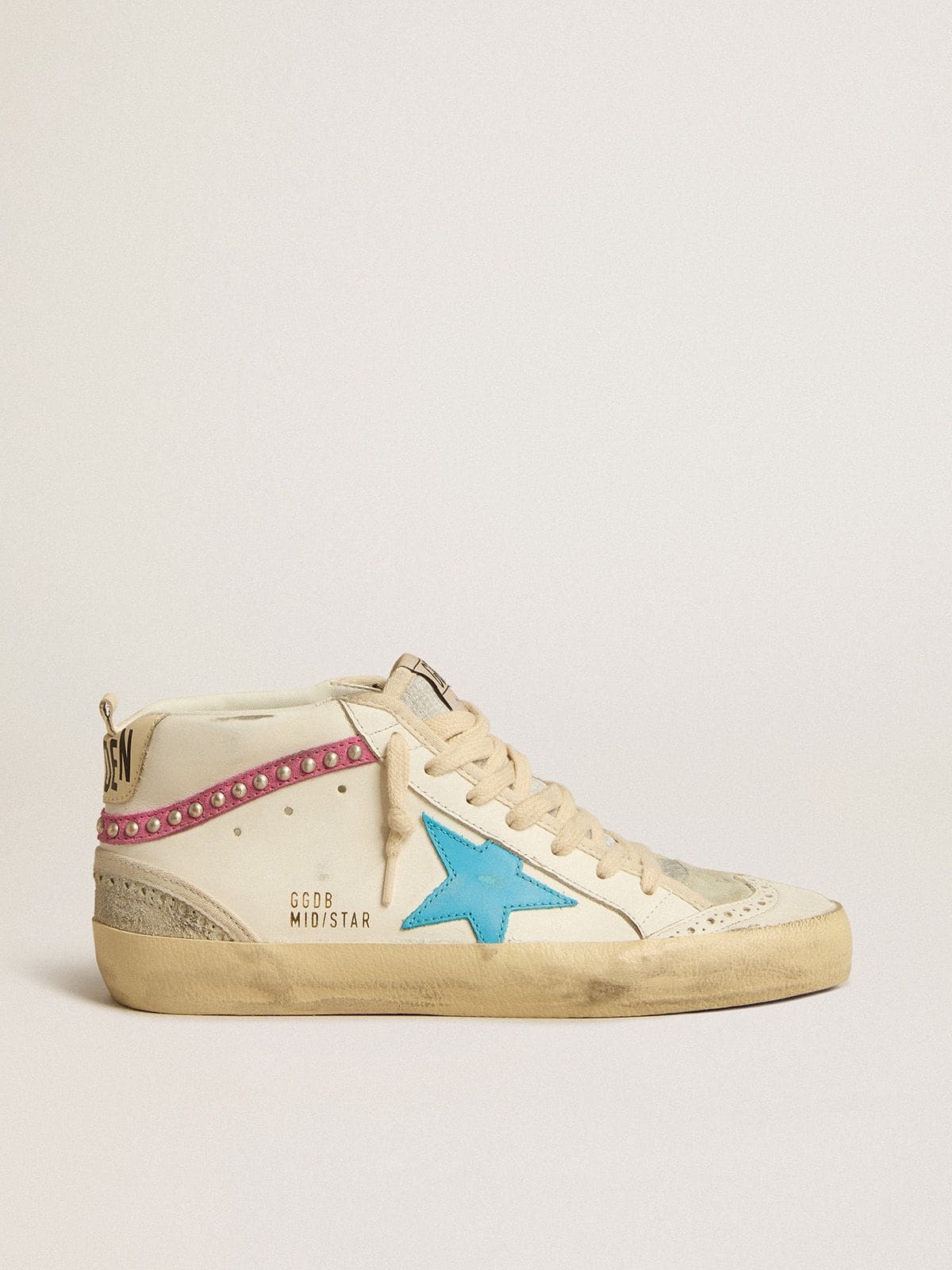 0d339b0d4185d78d28178922e235b8541f11610f82f1285f527dfe8a9758c6a6 Women's Mid Star in leather with light blue star and fuchsia suede flash with platinum studs - Image 1