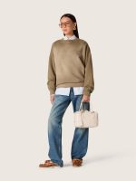 Golden women's boyfriend jeans in stone-washed light blue denim - Image 3