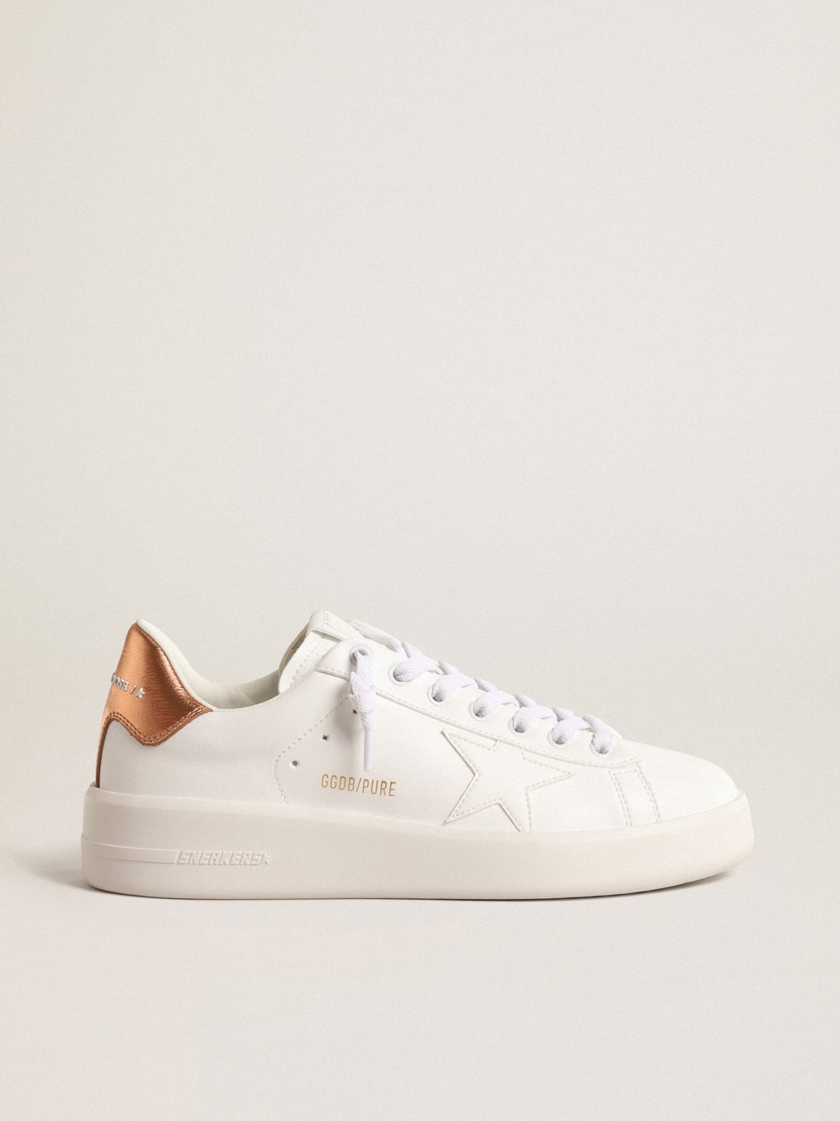 1704df16e2f92ba51c63d5fc100046cfa59f044374b6b65915c855195cf09942 Women's bio-based Purestar with bronze metallic leather heel tab - Image 1