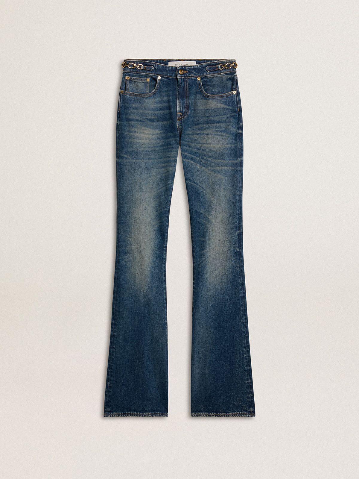 18057984c164759e28fb44669b686a60272a66c023a3b8a4a0f90d461af7f14b Women's bootcut jeans with a vintage wash and metallic details - Image 1