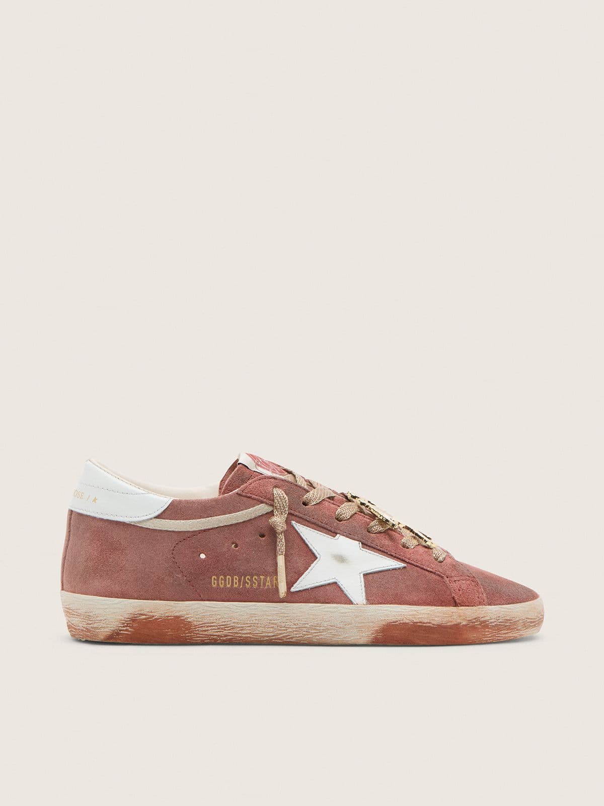 199c205d5e575385f736043c468bdc52d768e190f8caad5328dced065458fb48 Women's Super-Star in rust suede with metallic platinum leather star - Image 1