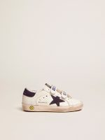 Old School Junior in white leather with blue suede star and heel tab