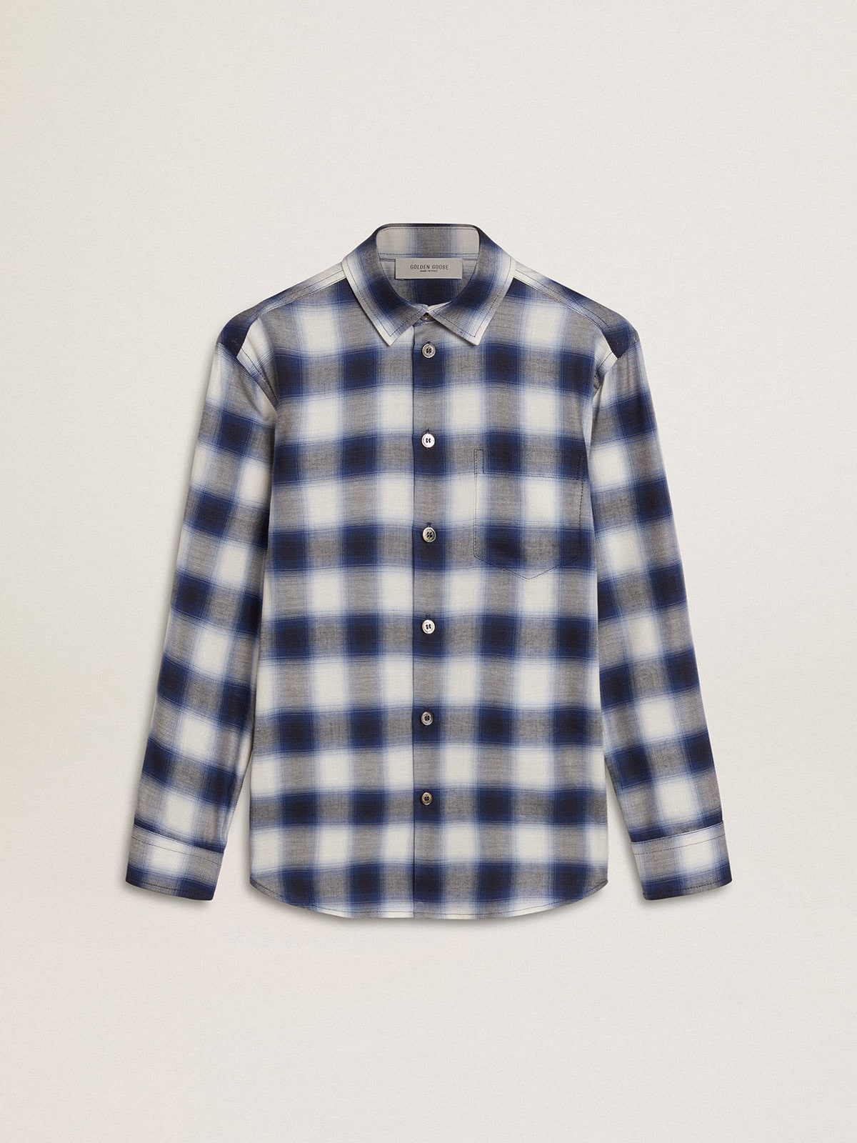 23ff8cf5c086c915cc9fe0f24999c5381991bc9991867725aea4222fe7a834ad Boys' blue and white checked shirt with print on the back - Image 1