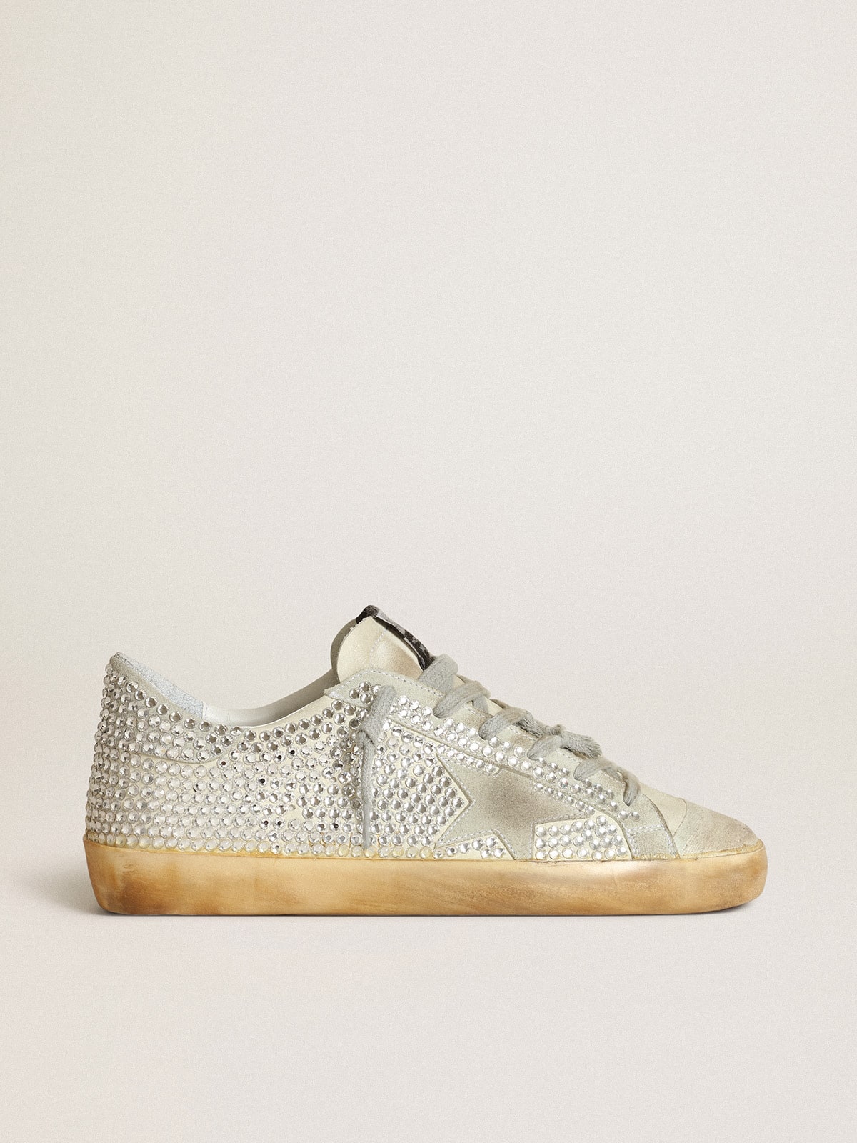 258d75a1abbf284788744a20fb992ca0dee1682747f7e556f774d524cb23ba3d Women's Super-Star in aged white nubuck with Swarovski crystals - Image 1