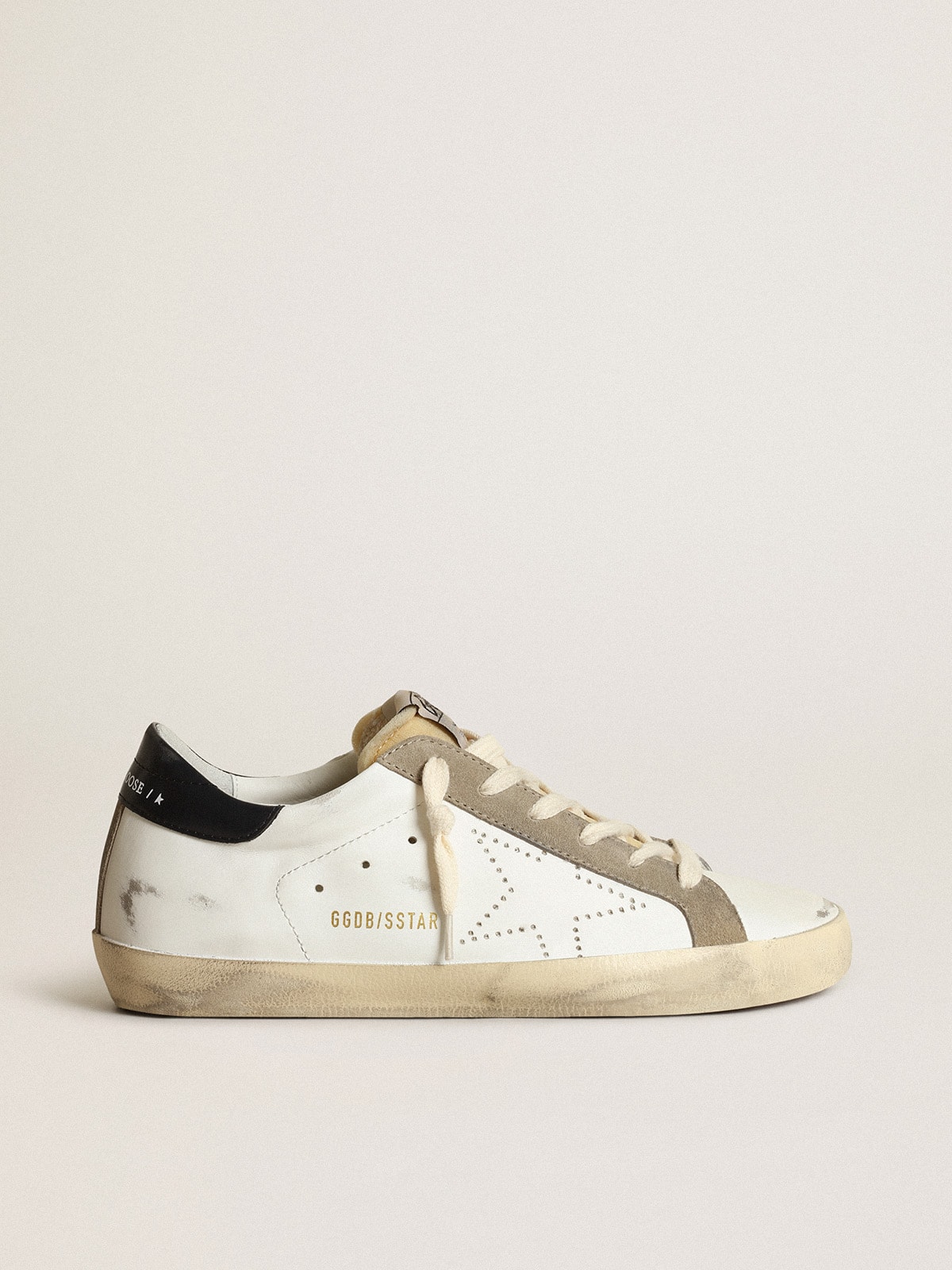 30be45fdff69ab09be8d41516cc486f3396c3ad8344303e3ea7fe812766ec004 Women's Super-Star with perforated star and midnight blue heel tab - Image 1