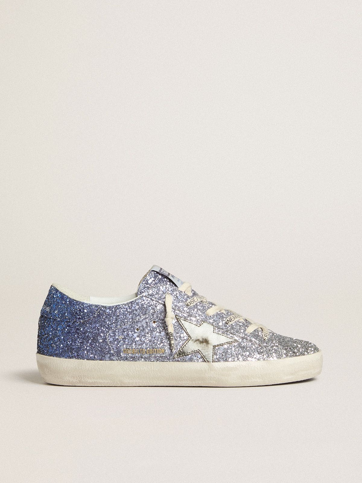 3386fe70a3ff805a70ae4d22f9397e943006835ef9f3a0432e29bd3ab606e07f Super-Star LTD in multicolor glitter with silver metallic leather star - Image 1