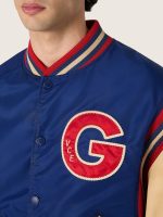 Men's blue varsity bomber jacket with beige leather sleeves - Image 4