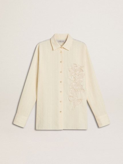 Women's cream-colored cotton shirt with floral embroidery