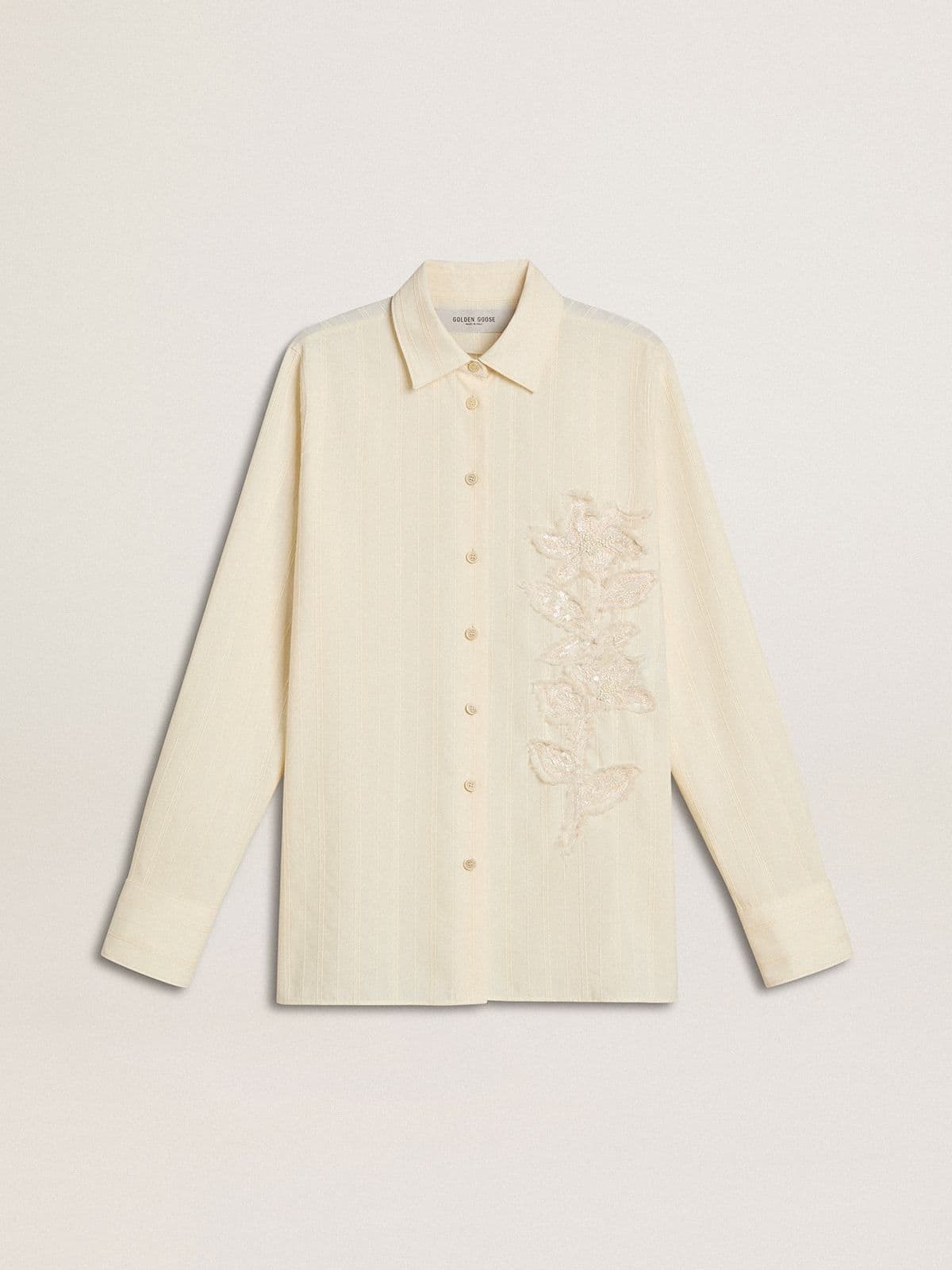 37257414ceeedf68ef5259883f0e7d1c2e6e0dddabe51ae2ca93c508db66f4b0 Women's cream-colored cotton shirt with floral embroidery - Image 1