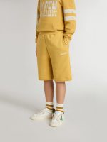Kids jogging shorts in ochre yellow with embroidery - Image 2