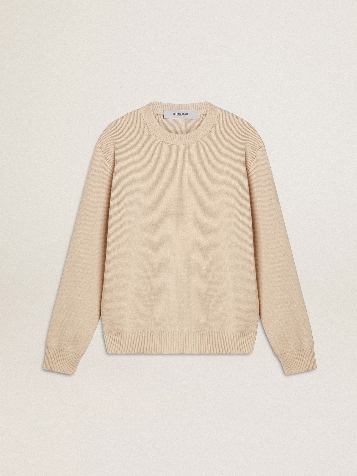 4057b4907116e493ab03b67ce63719a8e90e1e3c1ae748087a299ff171ca5f05 Women's beige sweater with 'Golden' lettering on the back - Image 1