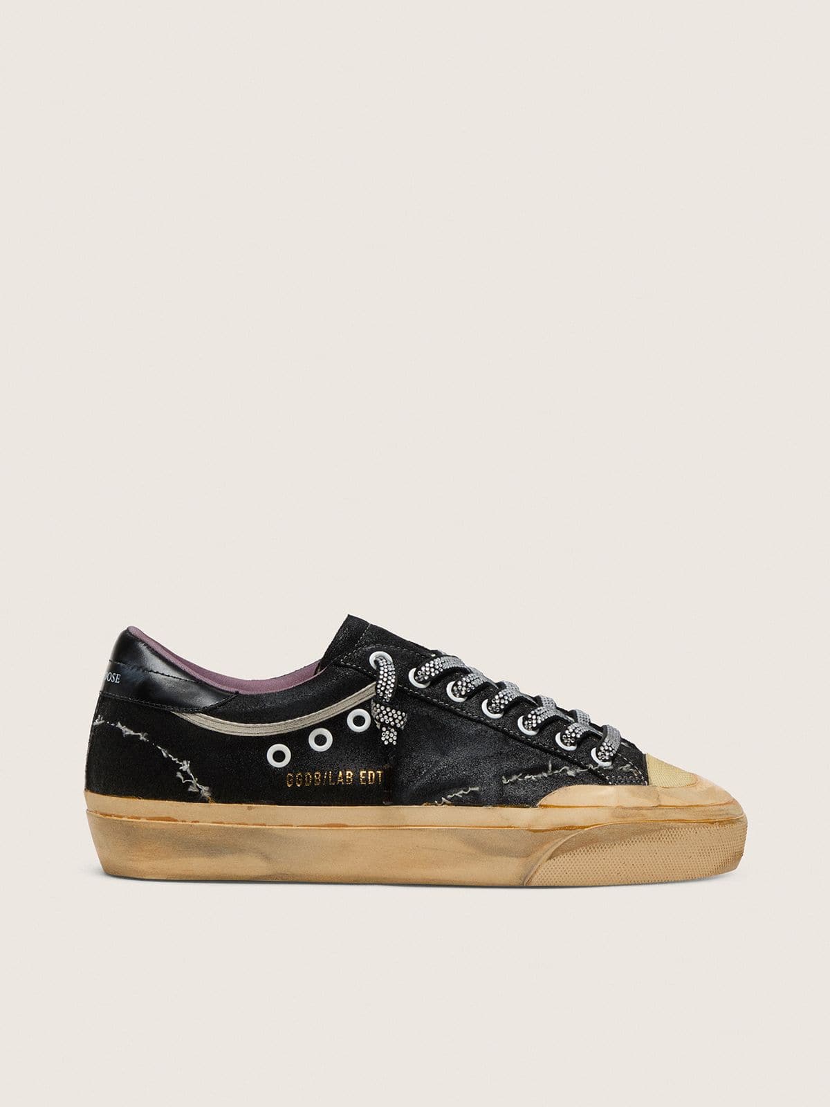 40998e34d5809bddd17661708ebd483e451db114911989bf94f2bb2bab979699 Men's Super-Star LAB in black laminated suede and nylon with raised star and laces with crystals - Image 1