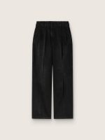 Women's pants in black cotton denim with a lived-in treatment