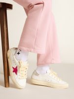 May Young with fuchsia glitter star and metallic leather heel tab - Image 3
