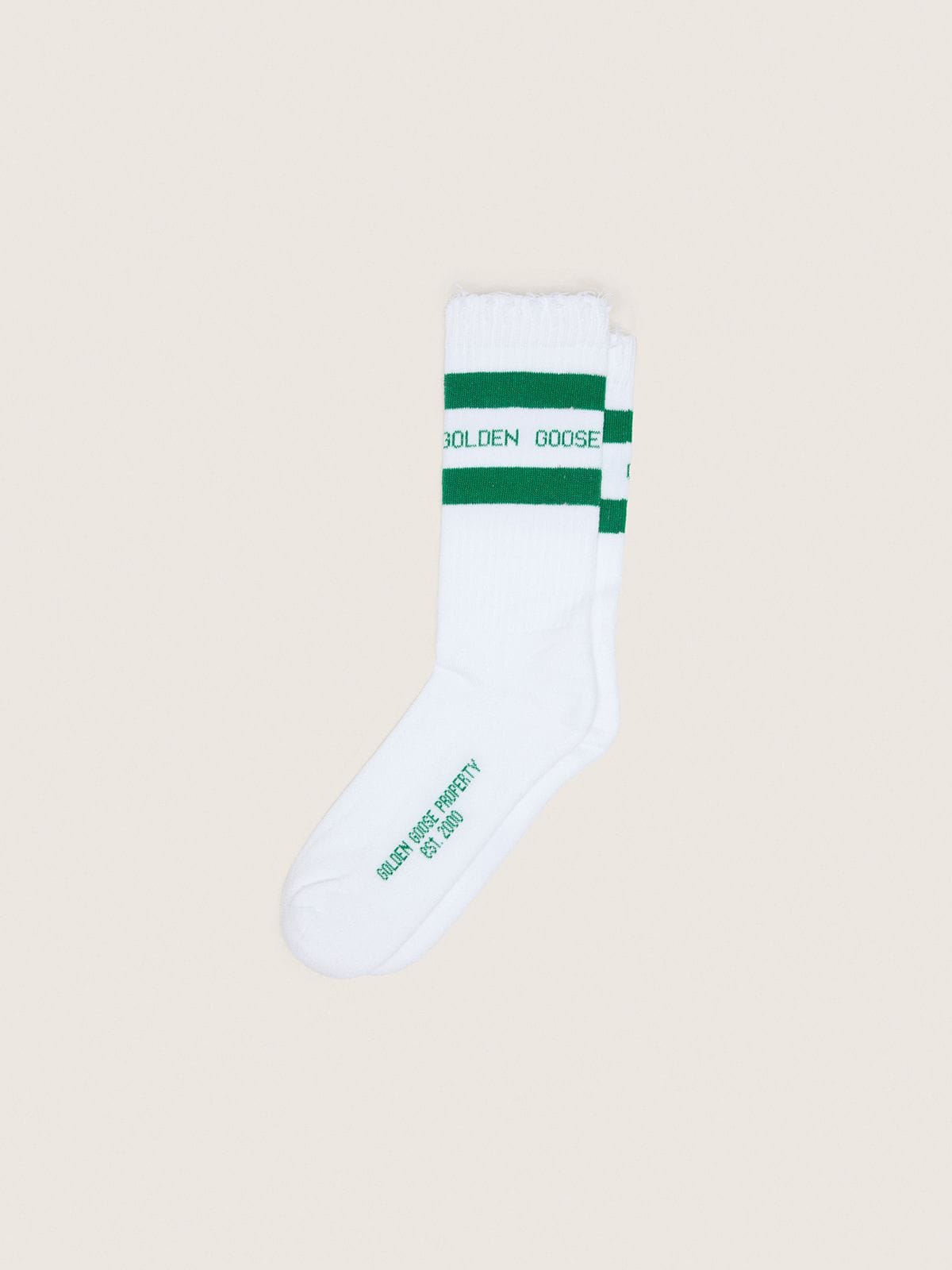 45bd16a3c6733fbd076434119b53fe284d8696fca199e26c8f9080825d070e2b Cotton socks with distressed finishes, green stripes and logo - Image 1