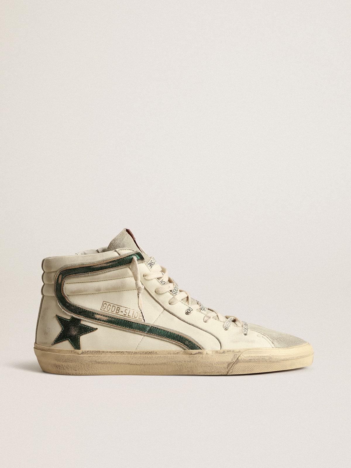 45fd4d0eaa19ae683e2852f1961bb3d61e863a1655fc258633512ad38240f9b6 Slide in beige nappa with green laminated leather star and flash - Image 1