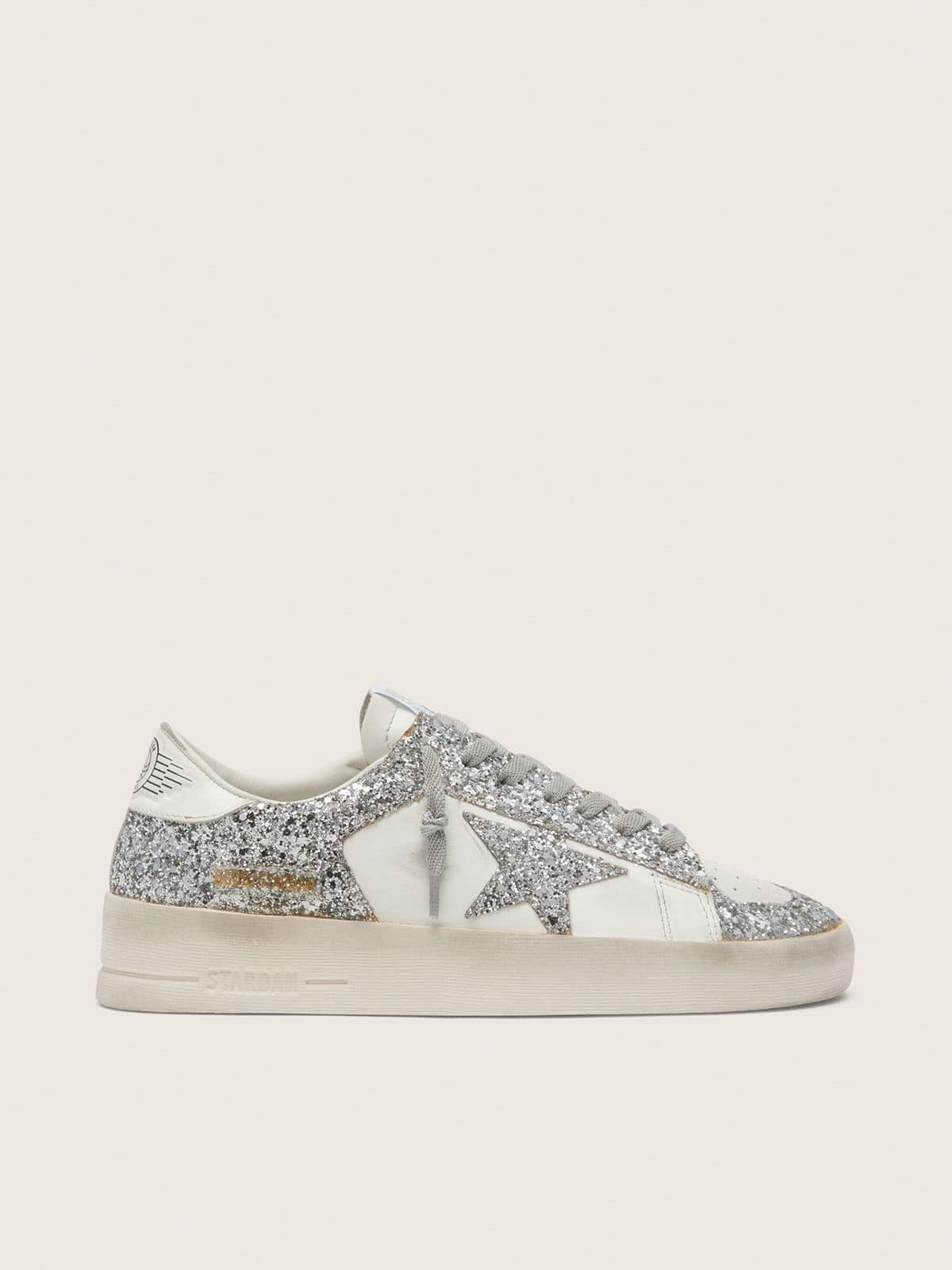 48c5267b81d3ce59da1337b51a5e91f09c343113eb24c5b5cf0a4562c691008e Women's Stardan in white leather and glitter - Image 1