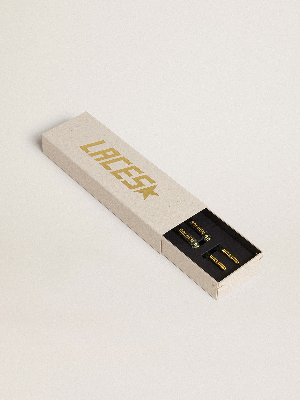 4d1b2f6dece38ffa73a4ad93b1d463a8534709dafe12bc76b6596ae178ae54be Dark green cotton laces with contrasting gold-colored logo - Image 1