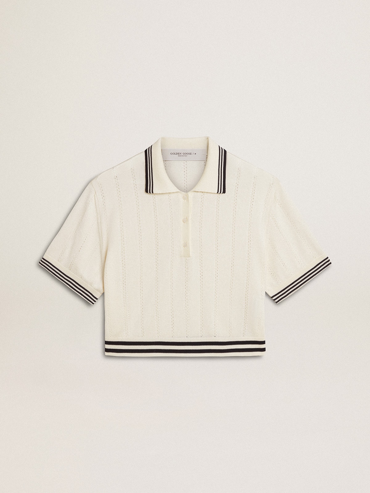 54dbc2d8494cfbd42d441efc024bd2ad7064d24c735d2eceb7b58b2175831691 Women's cropped worn-white cotton polo shirt with blue ribbing - Image 1