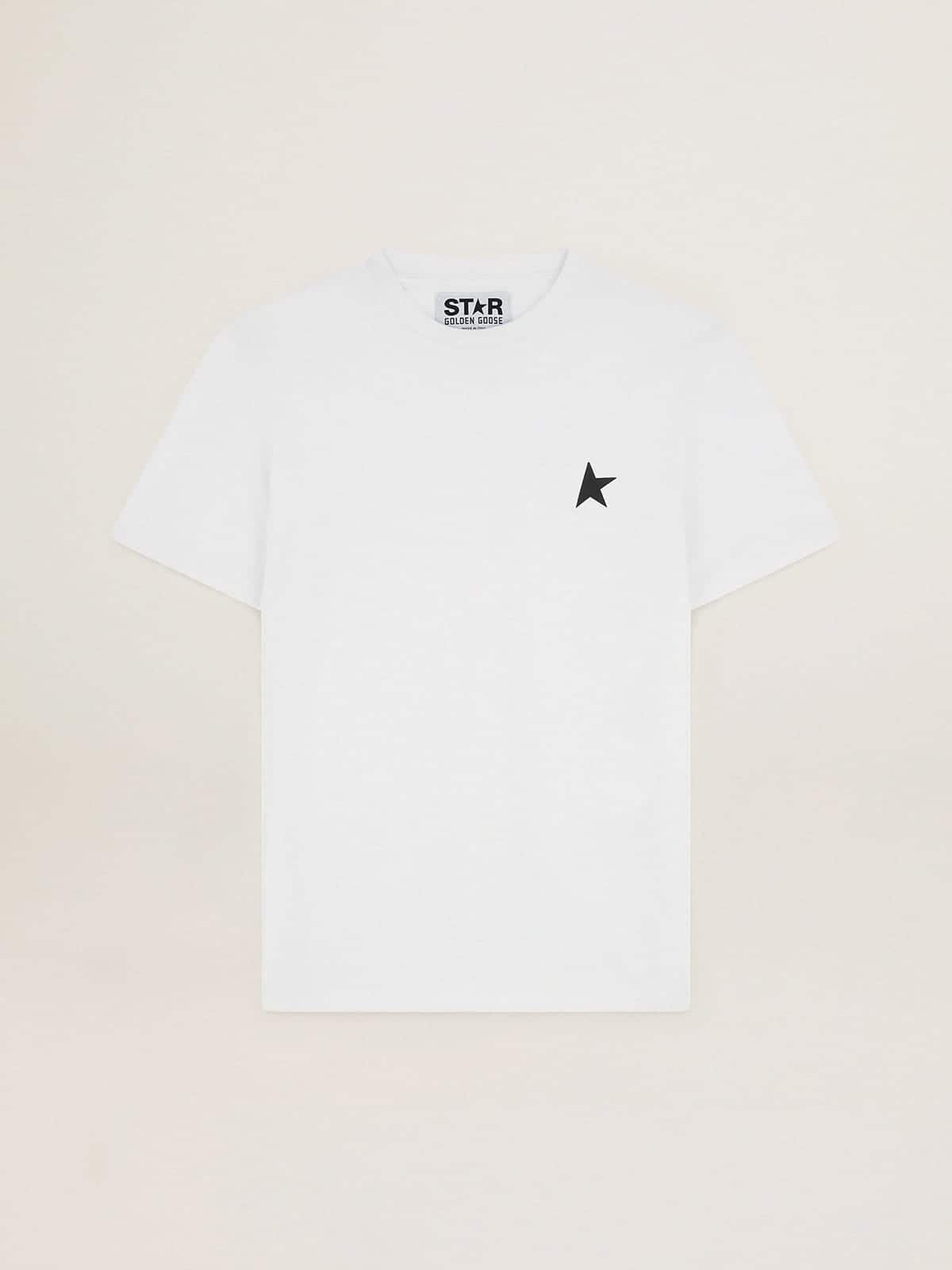 5859d7876a5f62fdae9d90455ecf29e5b6fb250ca90395853b0c173a4de069f7 White Star Collection T-shirt with black star on the front - Image 1