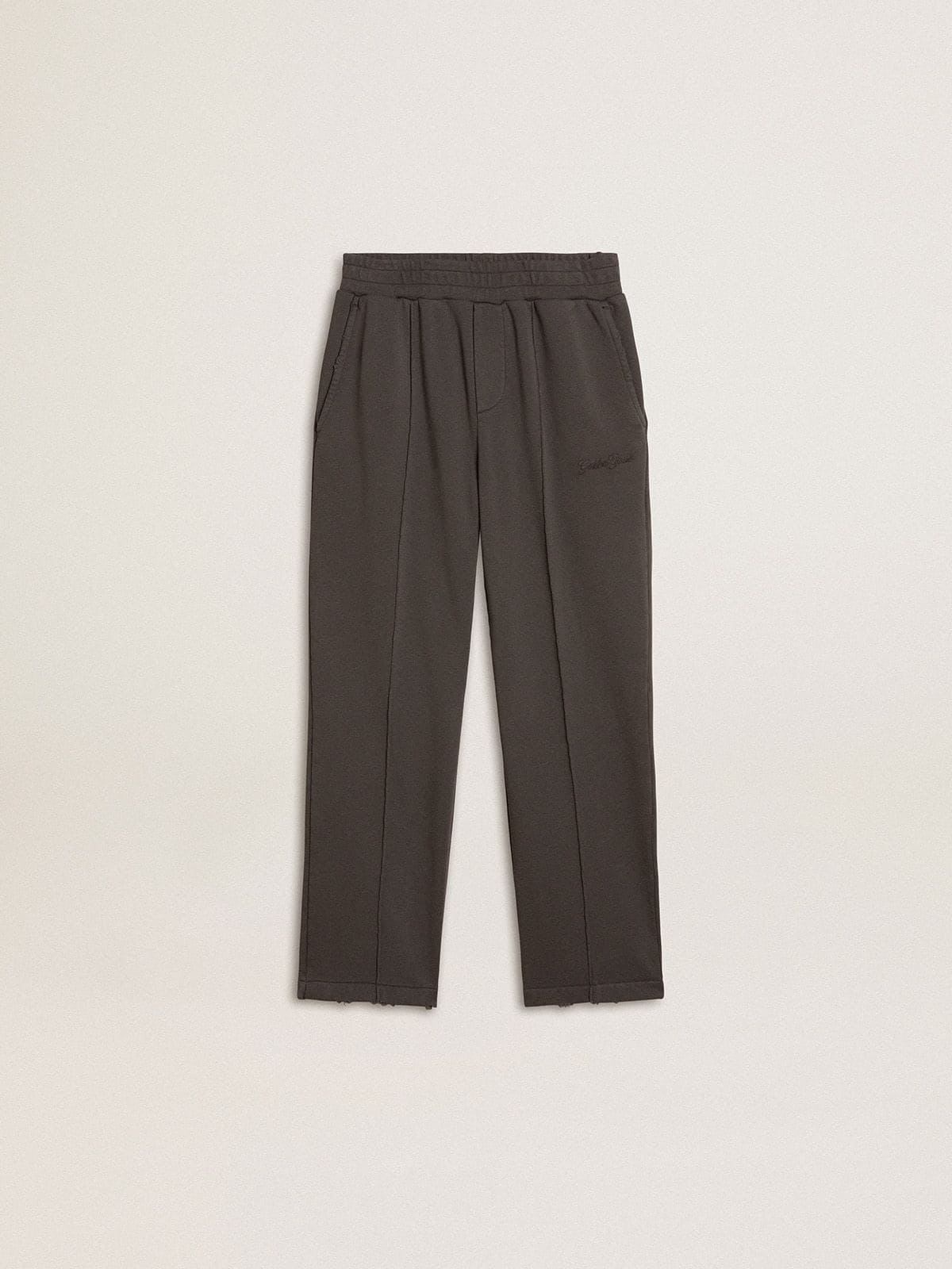 58856decd283fb3491592fb068241aaec51b25e661c7bb69f0a41b78142fee90 Kids' military-green jogging pants with embroidery - Image 1