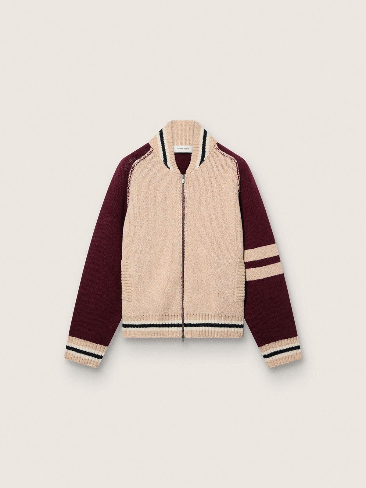 591a0a10c8fccbfe0d2af9b092d7728a0b9c6bf63d36f7b5c977c3e09a59496e Unisex bomber jacket in white and burgundy jacquard knit - Image 1
