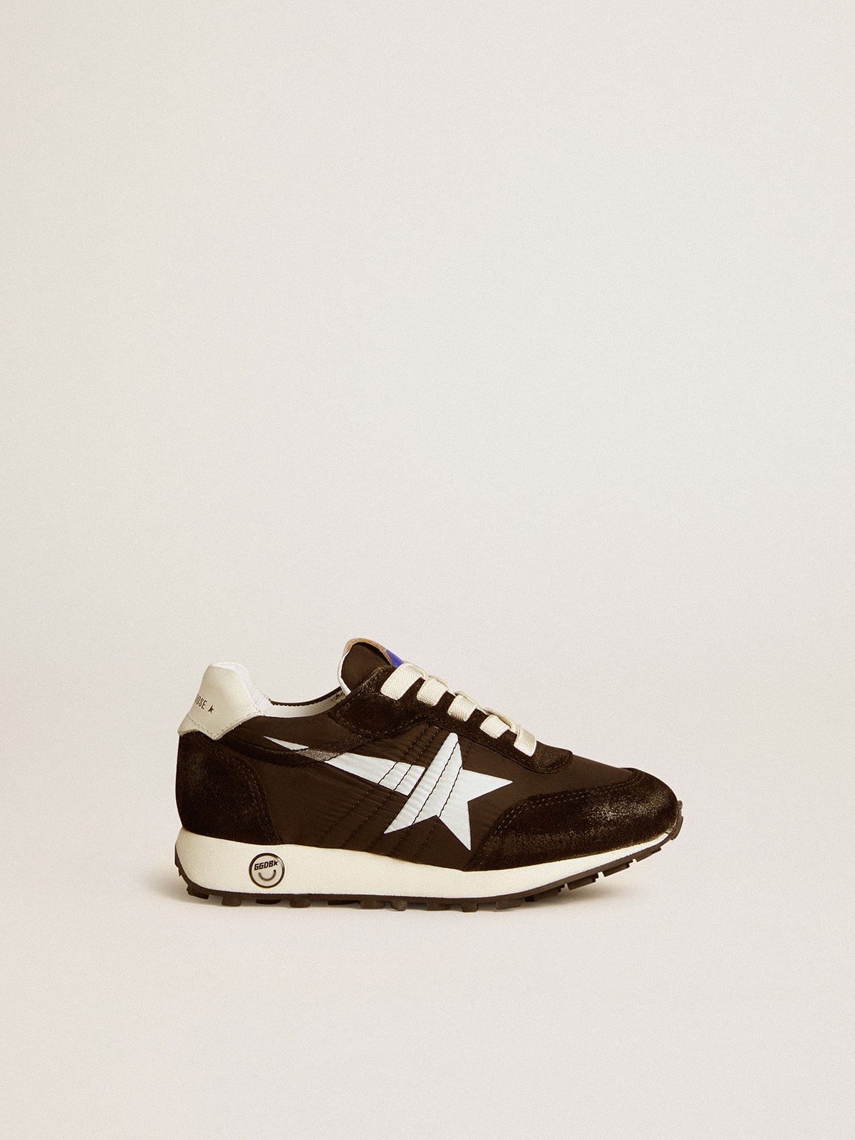 5ad730107ca508e114126041ad9e7e1f07a75d7b627c563726663c25164a2a53 Young Marathon in black nylon with printed star and leather heel tab - Image 1