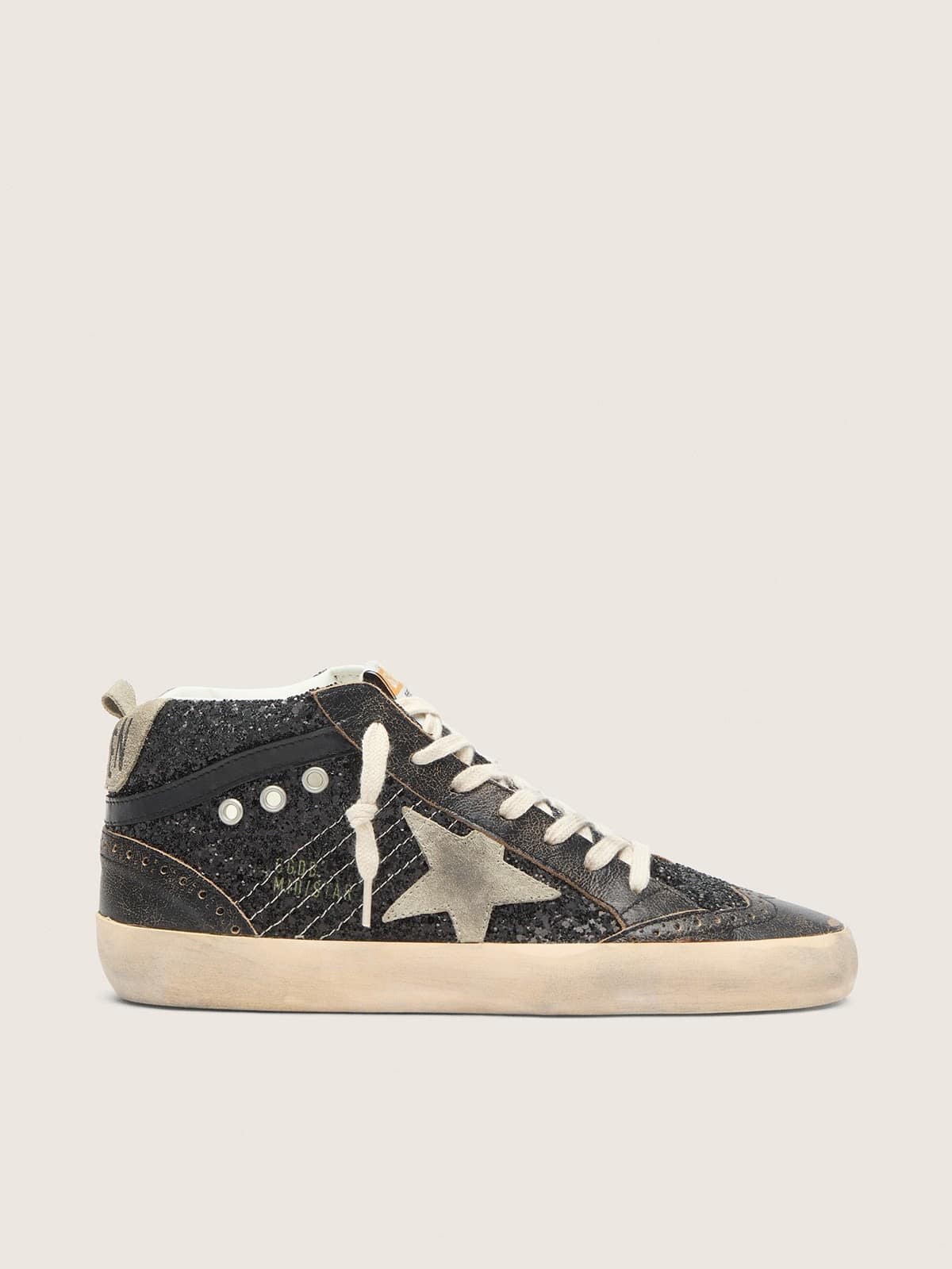5b8cb3f6152ae54f5b7fa26477d734afcba9c64e111d8e8ab518e39283d8d3e4 Women's Mid Star in black glitter with dove-gray suede star and heel tab - Image 1