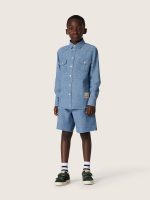 Journey unisex shorts in light blue cotton chambray with embroidered logo - Image 3