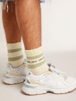 Worn-white socks with distressed details and sage-green stripes - Image 3