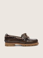 Women's Cruise loafers in dark green leather with dove-gray hiking laces and raised floral motif