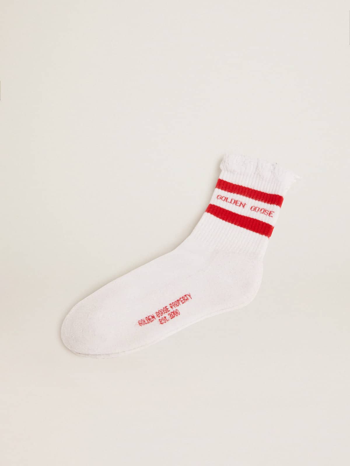 61702d1983fa070a95cc62deb75635afc47d42da80c65f00a8d670dd1033aa0b White socks with distressed details and red stripes - Image 1