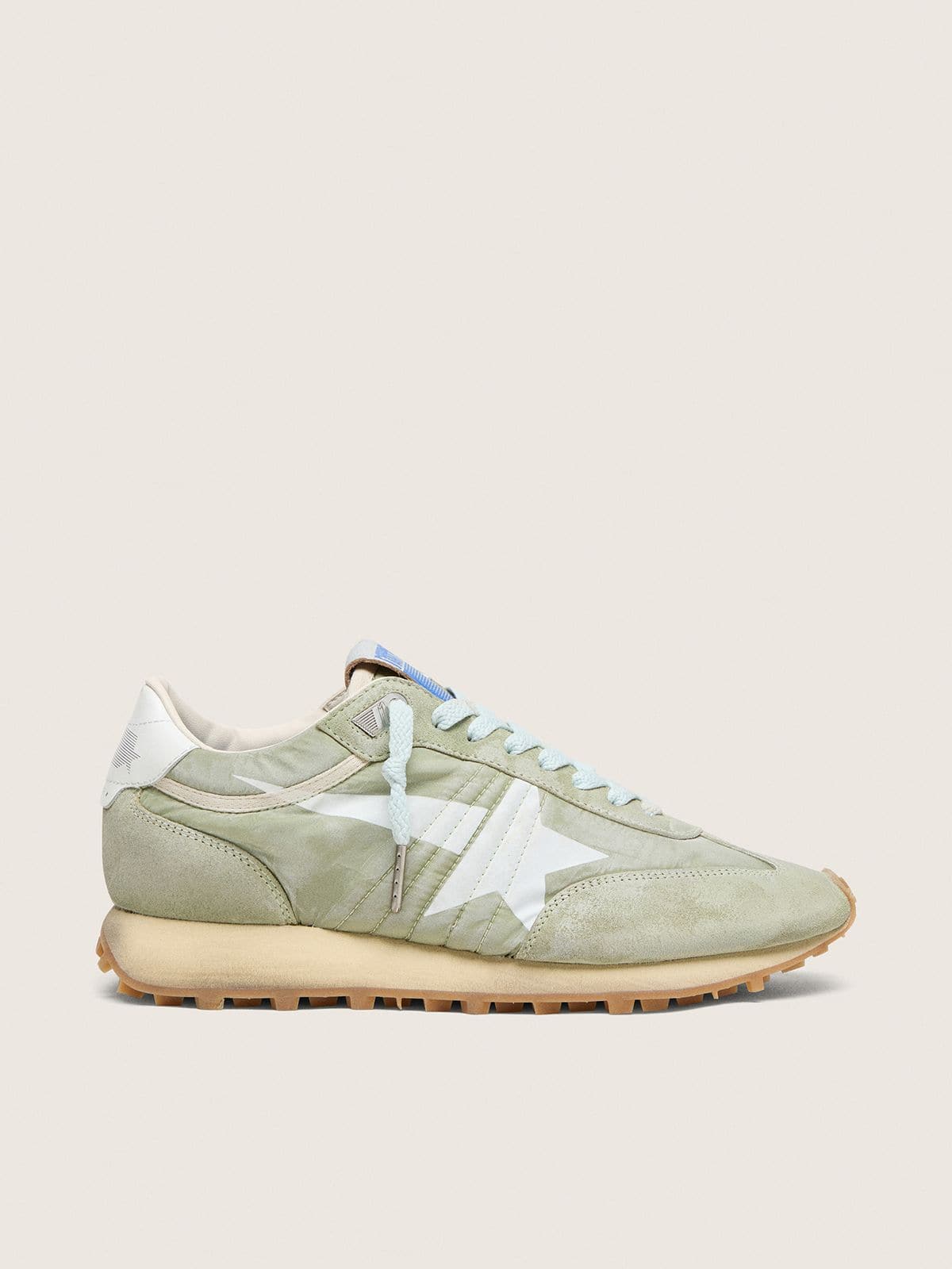 620a9ab328f9e7d9f3608114a9a440bb0a936d38562d9c42cb023496191c93c3 Women's Marathon in sage-green nylon with white star - Image 1