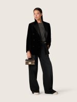 Women's pants in black cotton denim with a lived-in treatment - Image 3
