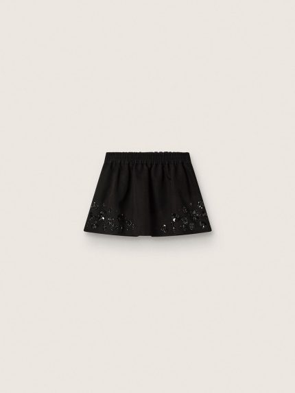 Women's miniskirt in black cotton twill with floral sequin embroidery