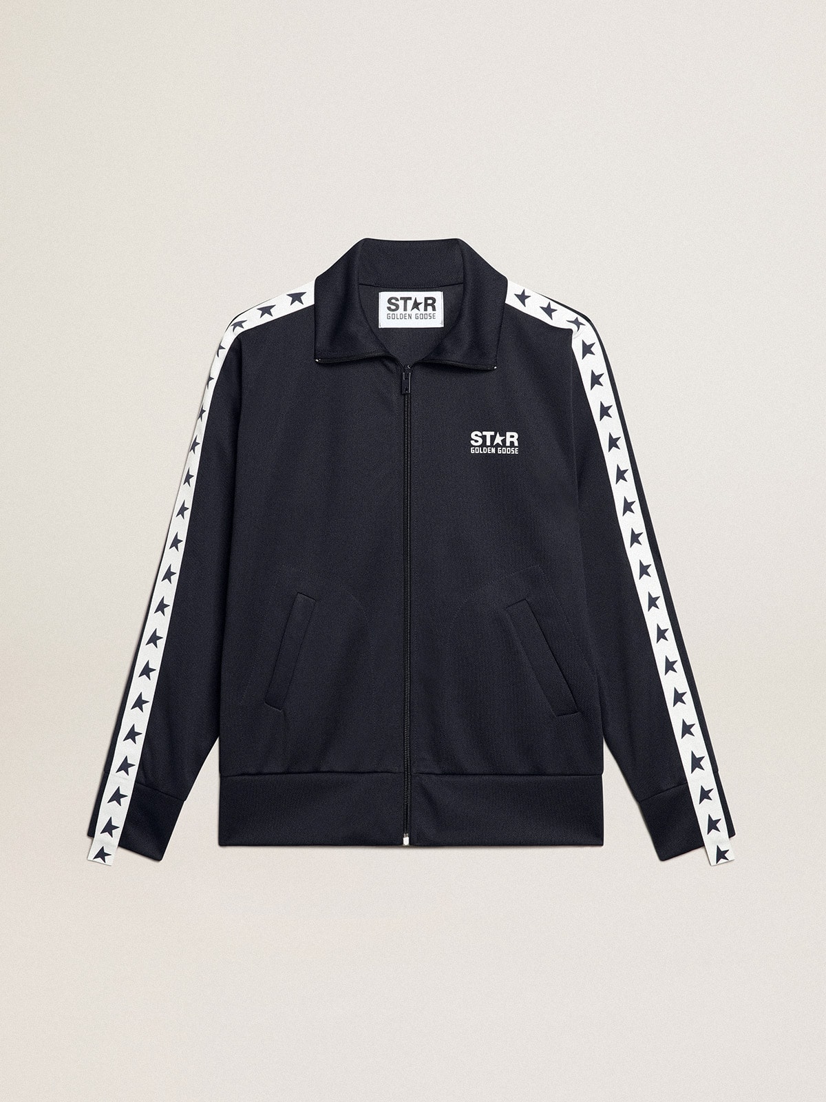646b48d71e511aa86d9e837e04b82bf83f6d2dc3f25c56636ecfa3c886ea13db Dark blue zipped sweatshirt with white strip and contrasting stars - Image 1