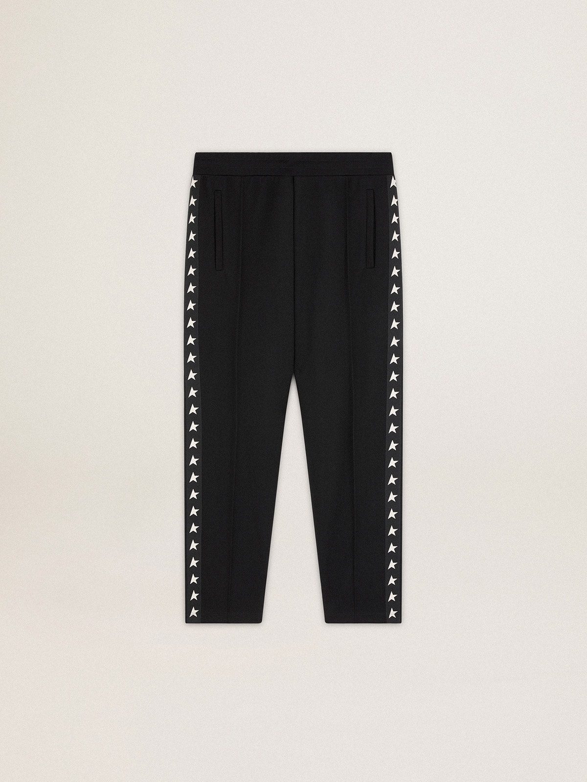 66f4dfe6cf830b66f73c852b17b03f8a9a9c0fad3cc439b6affed503d759108b Men's black joggers with white stars on the sides - Image 1
