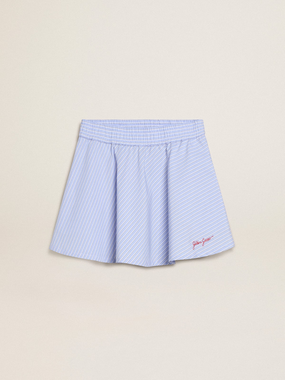 671ffe25dd986ba83b16bcb9b94b270e34f3e8b92a371afc168c072787f5daac Girls' skirt with light blue stripes - Image 1