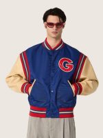 Men's blue varsity bomber jacket with beige leather sleeves - Image 5