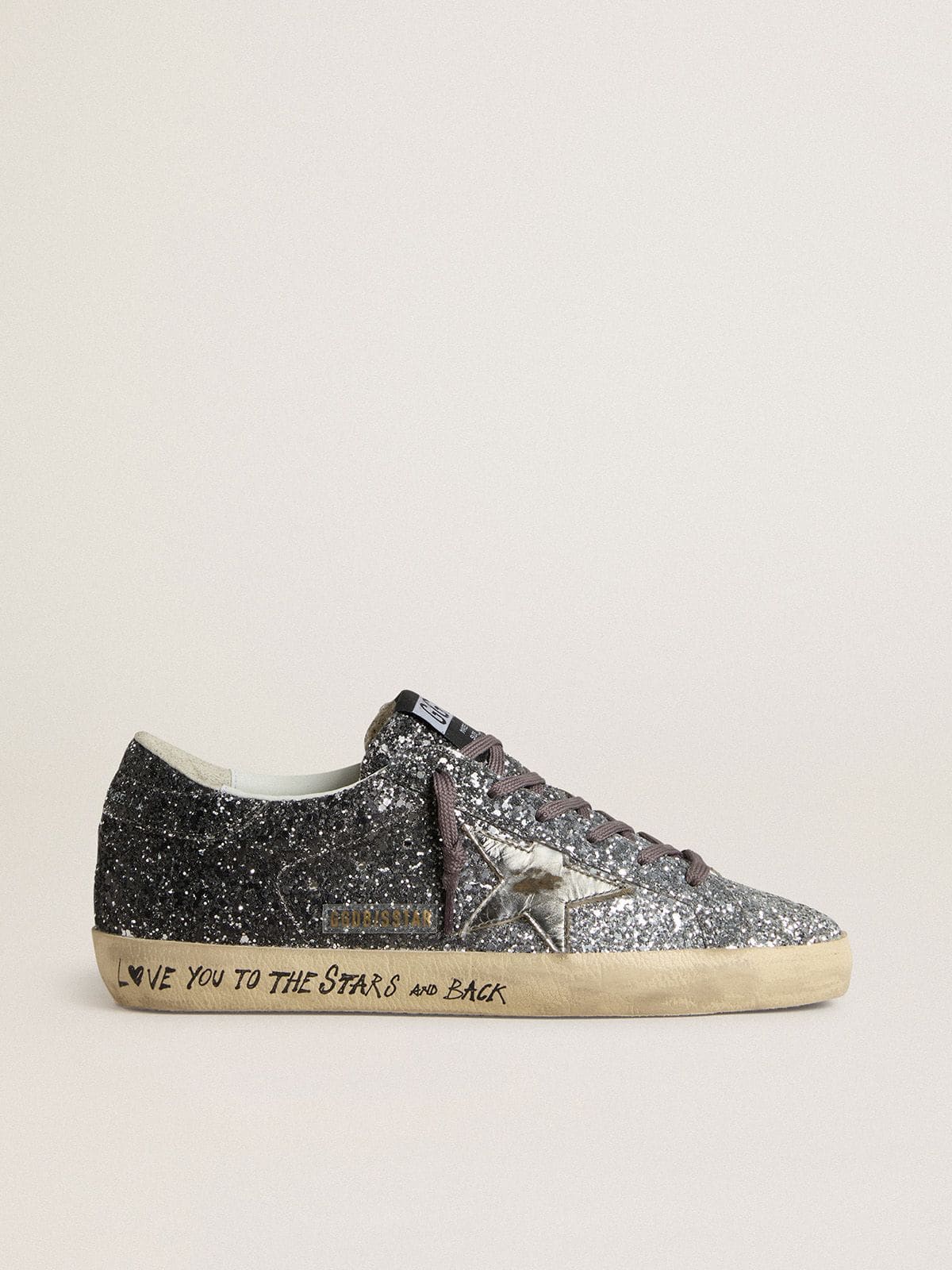 6aa0db4fe76b7730e929134519489b141ebe2ffaf1075d0572d781a1c4066a41 Women's Super Star with glitter upper and silver metallic leather star - Image 1