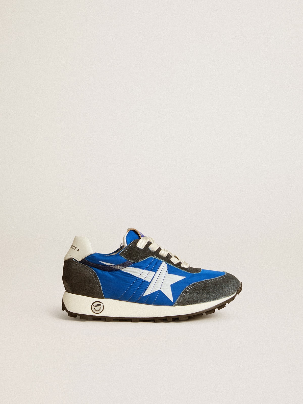6c92814214cf9ad4170e21691765cc48e08ae1568c2506558e43de4c3b404866 Marathon Junior in blue nylon with printed star and leather heel tab - Image 1