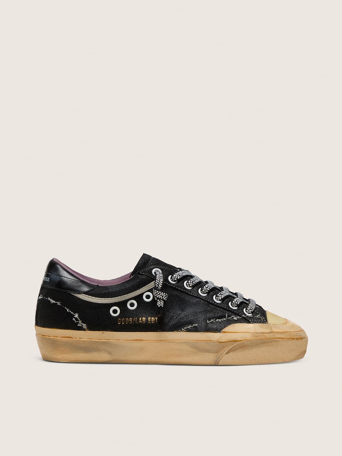 6c9f69e0a7bd9581c30006fe61fcba468fe3bfcd2caa11e28844bc8d9dcc7e18 Women's Super-Star LAB in black laminated suede and nylon with raised star and laces with crystals - Image 1