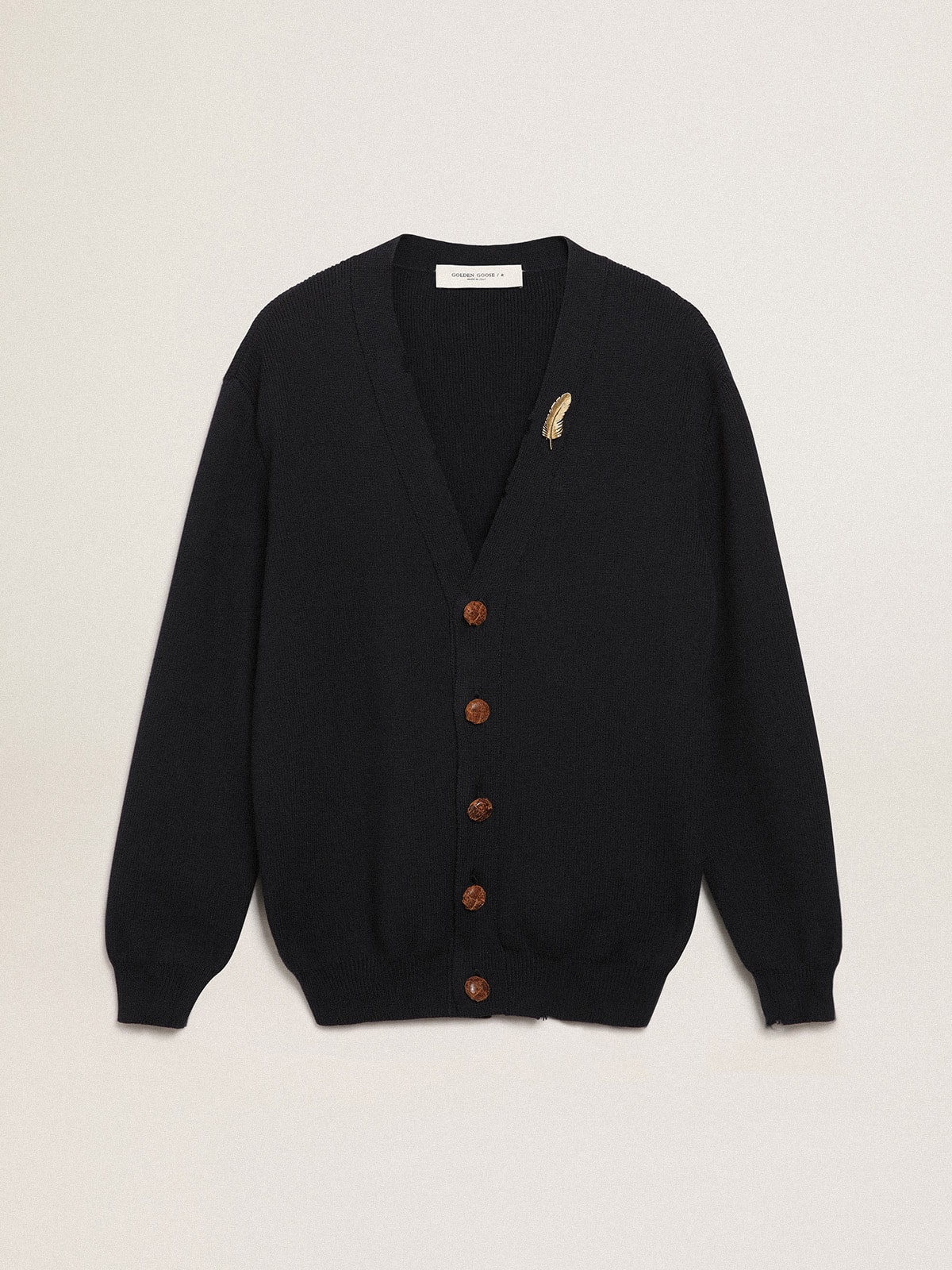 6e25fe41fea8c2a8a92db8afb8485c1ec74cc4f02bc8a296ec6b75ff832d664a Golden Collection cardigan in dark blue cotton with a distressed finish - Image 1