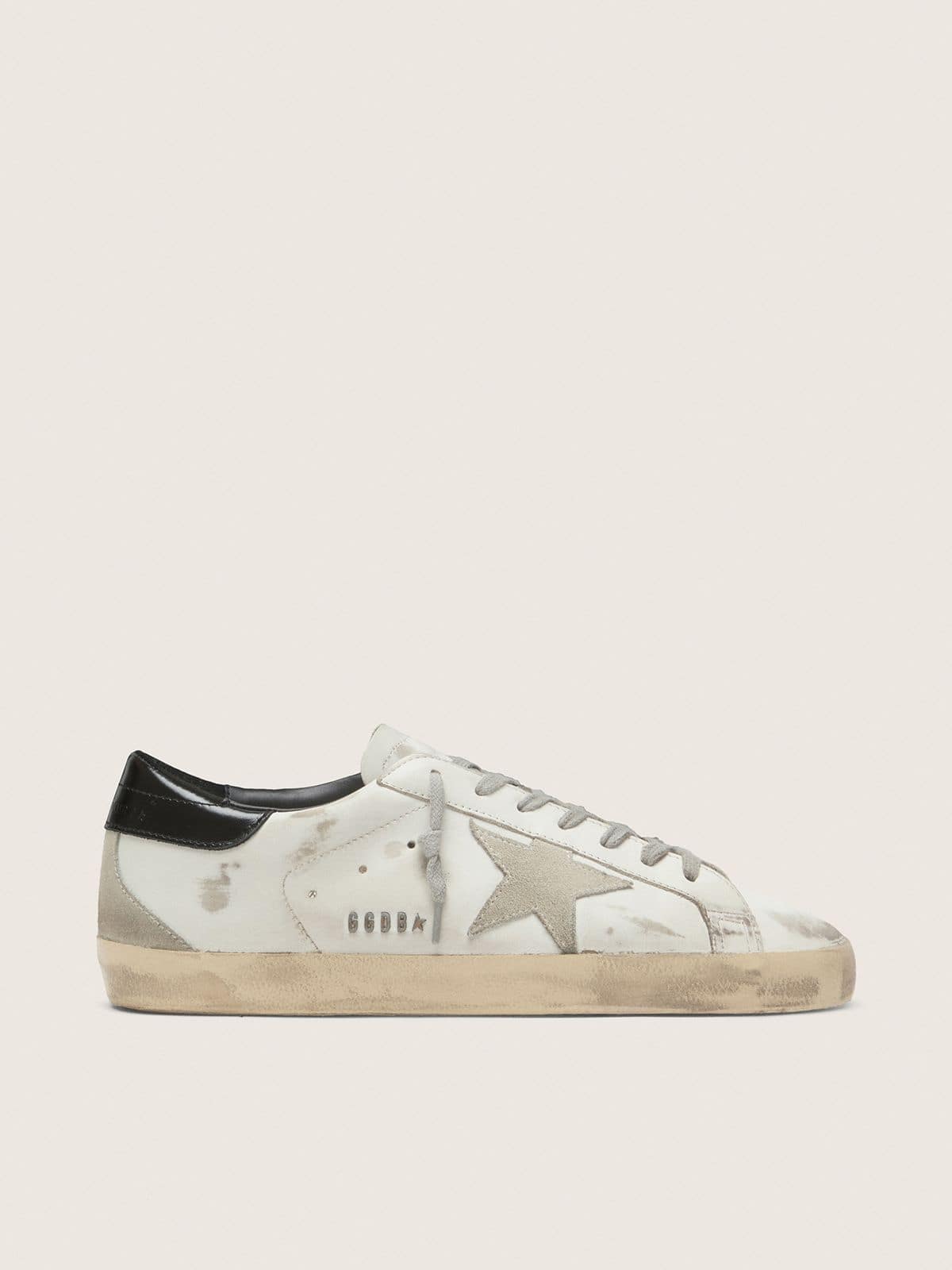 7054b39378a19541e1e3b8a6ac003d57dd76315da1e1254486af1503e82c3840 Women's Super-Star with black heel tab and metal stud lettering - Image 1