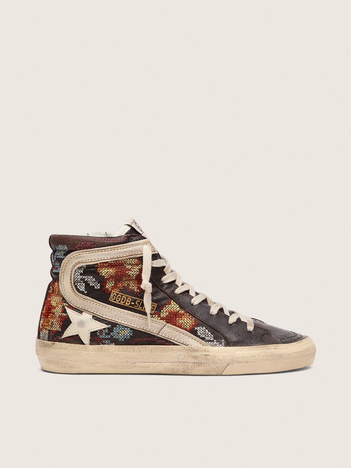 706bb535ed6126a3962685913cd8732193e589fa2f6848c11f5958a8c885b310 Women's Slide in ebony leather with cream star and multicolor embroidery - Image 1